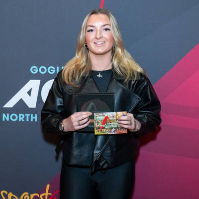 Casi Evans with the Junior Sportswoman of the Year award at the Môn Actif Sports Awards 2023