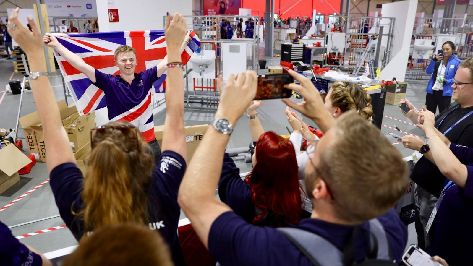 Skills awards students with flag