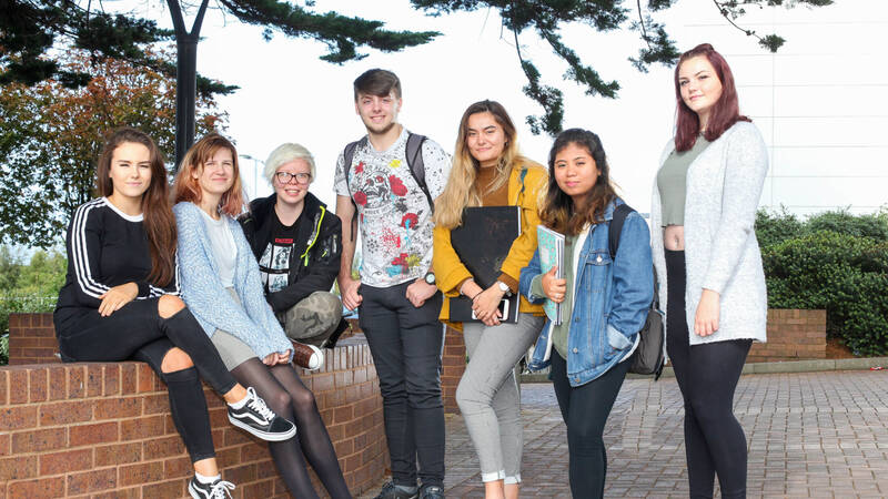 Several students outside the Rhos-on-Sea campus