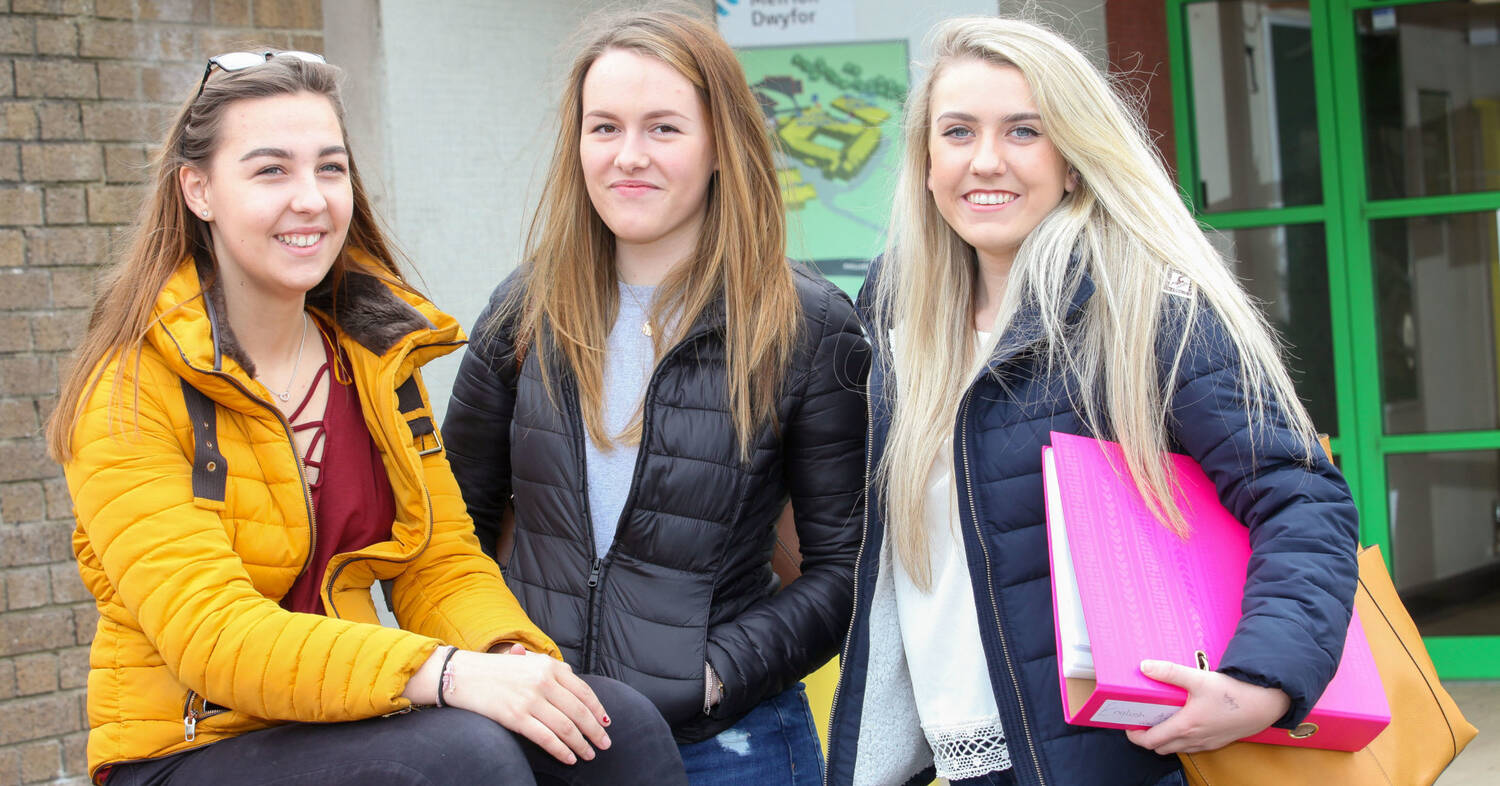 Three female A-Level students outside Pwllheli campus