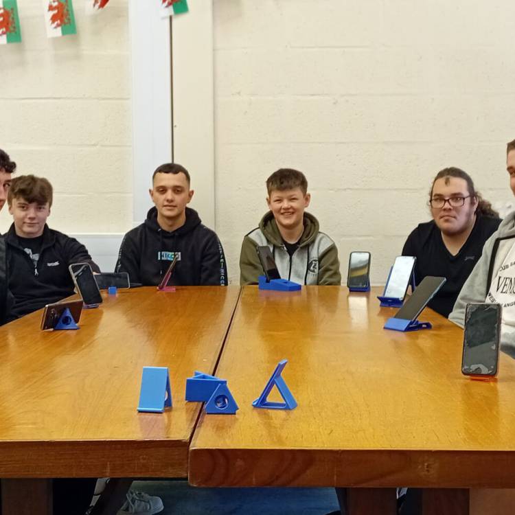 Coleg Meirion-Dwyfor students on the BTEC Enhanced General Engineering course with their mobile phone stands