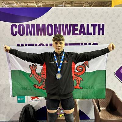 Cian Green celebrating with the Wales flag
