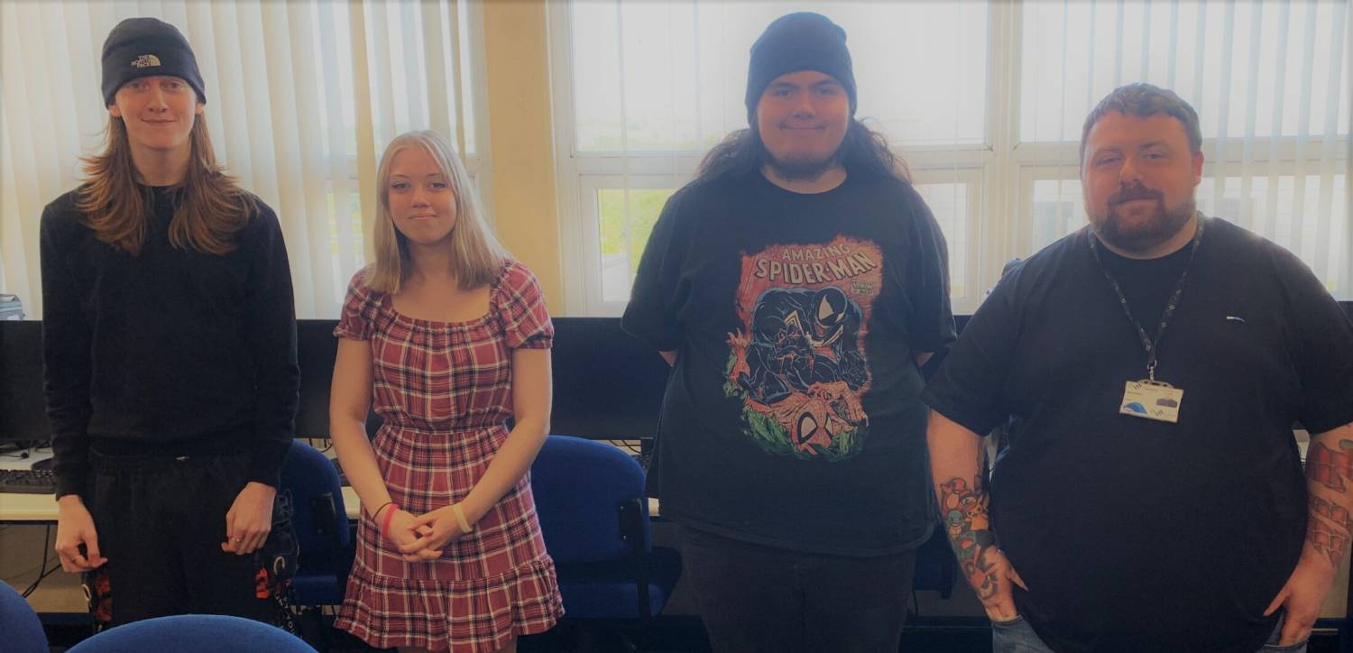 Students Lucas Grew, Lili Bacciochi and Tom Barry with tutor Rob Griffiths