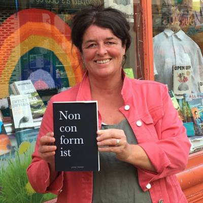 Jane Parry with her book Nonconformist outside Palas Print bookshop in Caernarfon