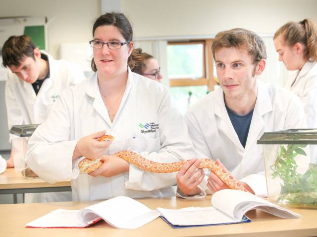 Students with a snake