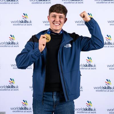 Osian Roberts with his gold medal from the WorldSkillsUK National Finals