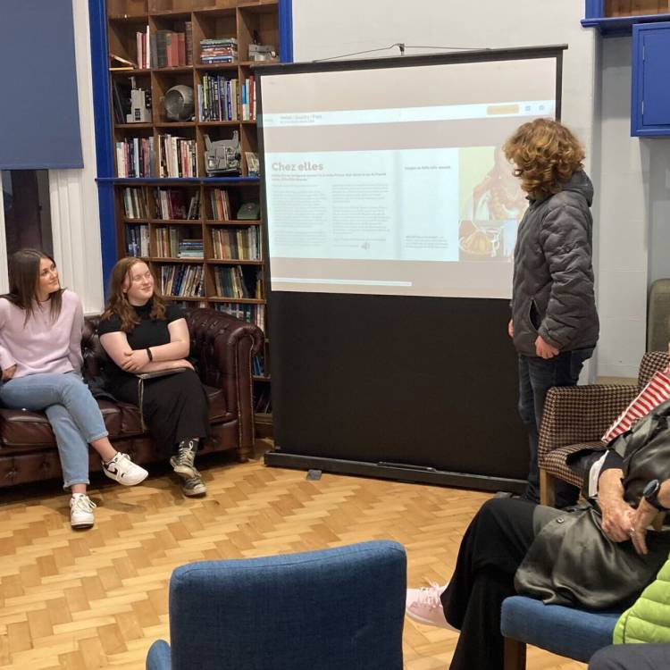 Coleg Meirion-Dwyfor student Osian Thomas giving a talk at a Pwllheli Rotary Club meeting