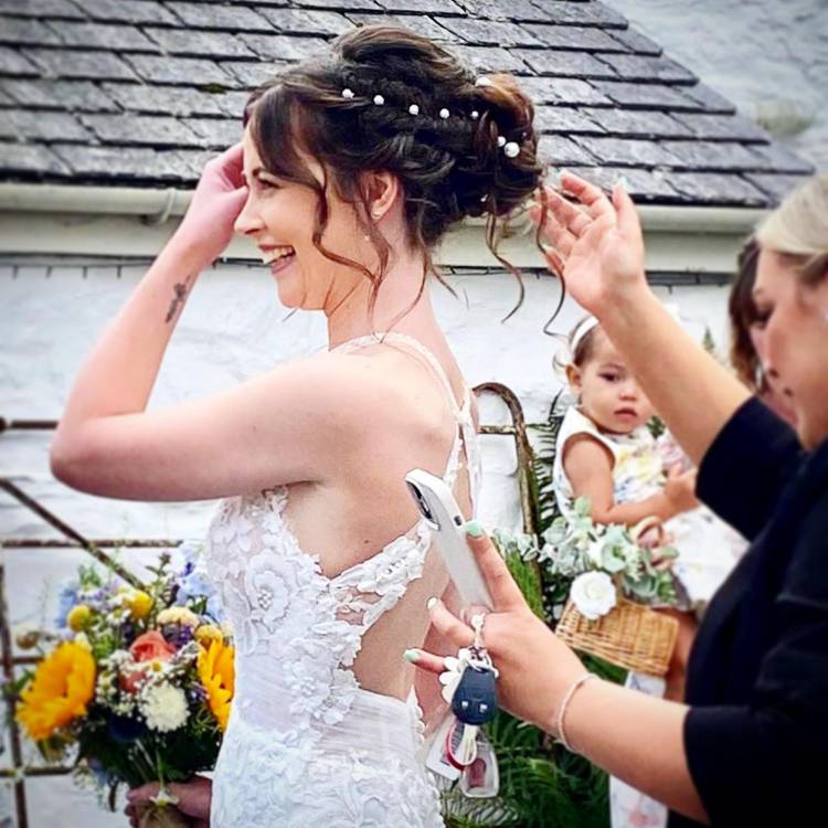 A bride with hair styled by Coleg Llandrillo student Heather Wynne