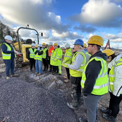 Anwyl Homes contracts manager John Wilson talks to the students