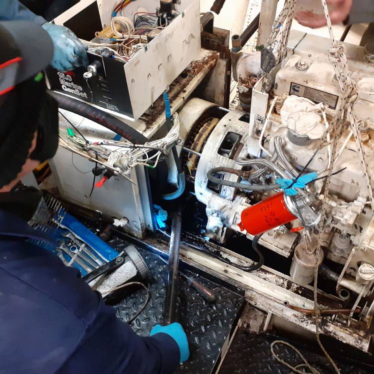 A student working on one of the generators for the Island Reach