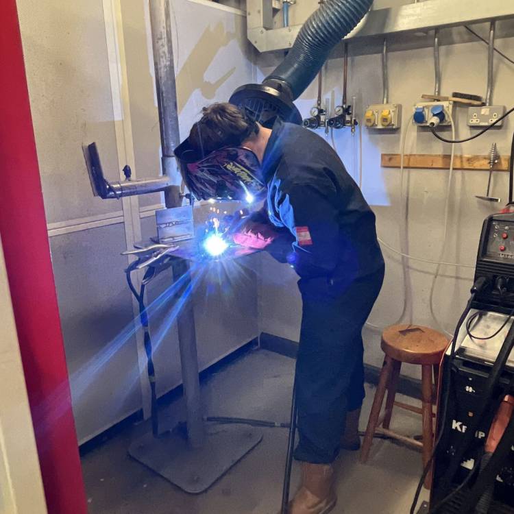 A learner taking part in the Introduction to Welding course offered by Multiply at Coleg Menai in Llangefni