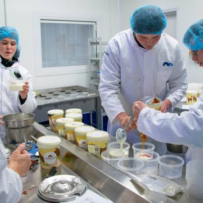 Students making ice cream as part of a dairy workshop at the Food Technology Centre in Llangefni