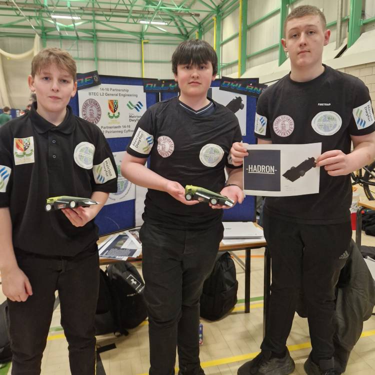 High-school students with their cars at the F1 in Schools North Wales heats in Denbigh Leisure Centre
