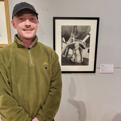 Joshua Griffith with his winning art work, ‘Biomorph #1’