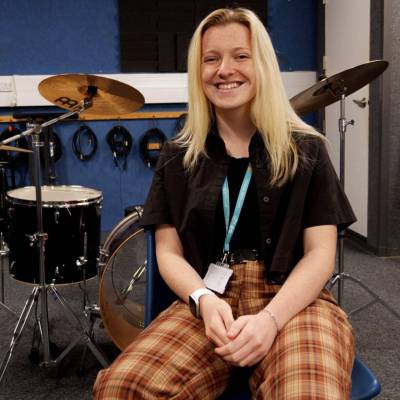 Hannah Popey in a recording studio at Coleg Llandrillo