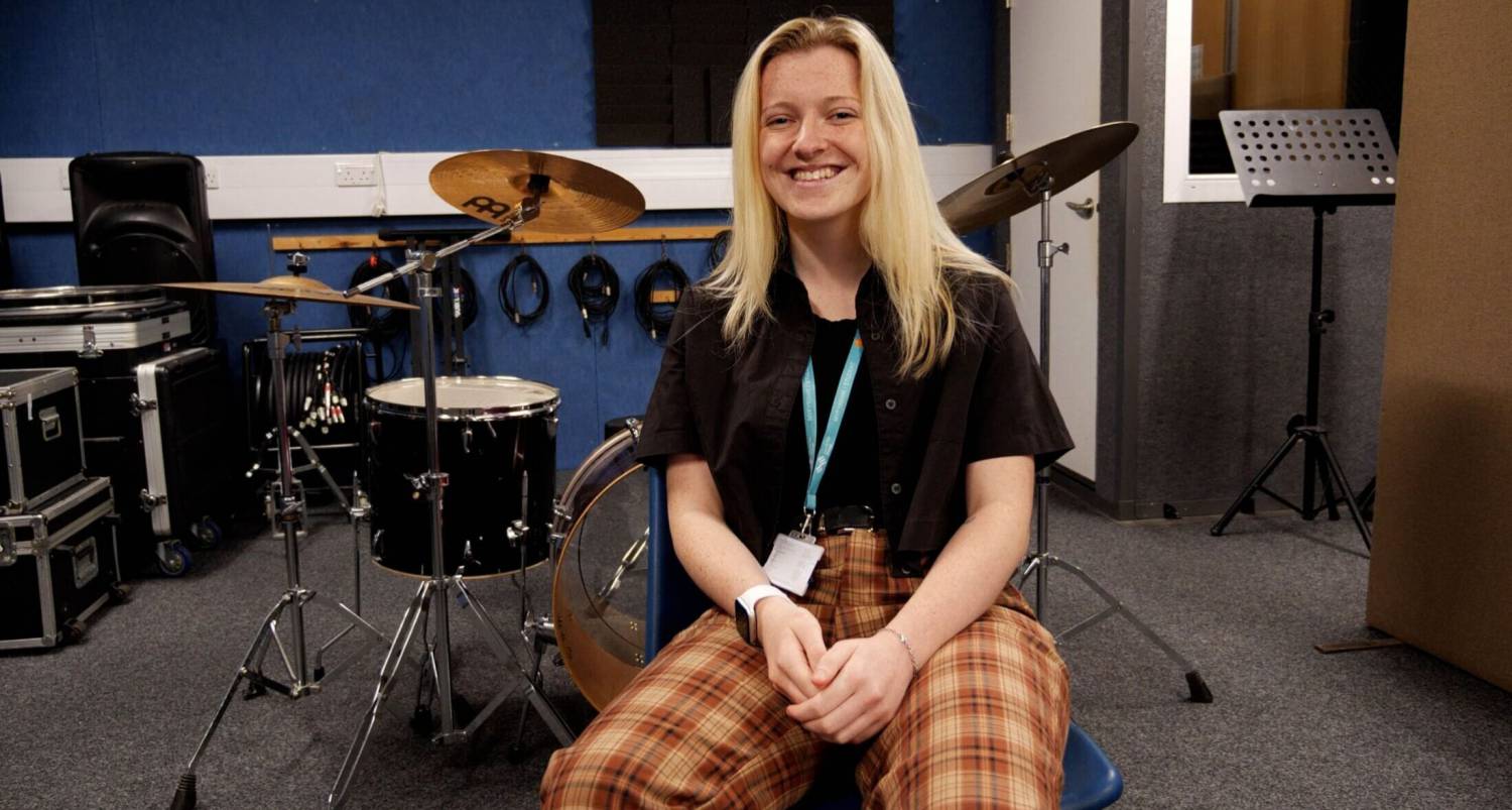 Hannah Popey in a recording studio at Coleg Llandrillo