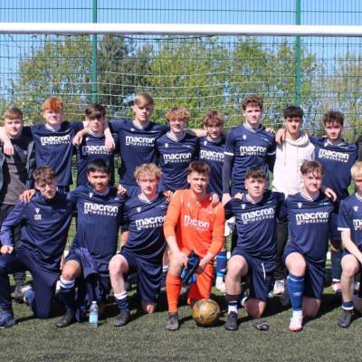 The Coleg Llandrillo Football Academy team after winning the league title