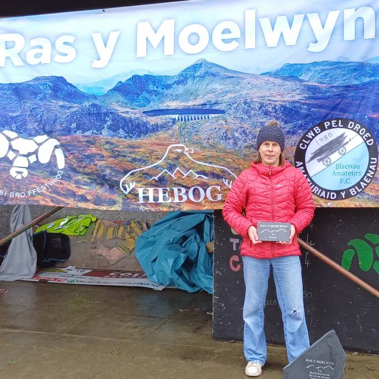 Alwen Williams with her prize after finishing as first female in Ras y Moelwyn