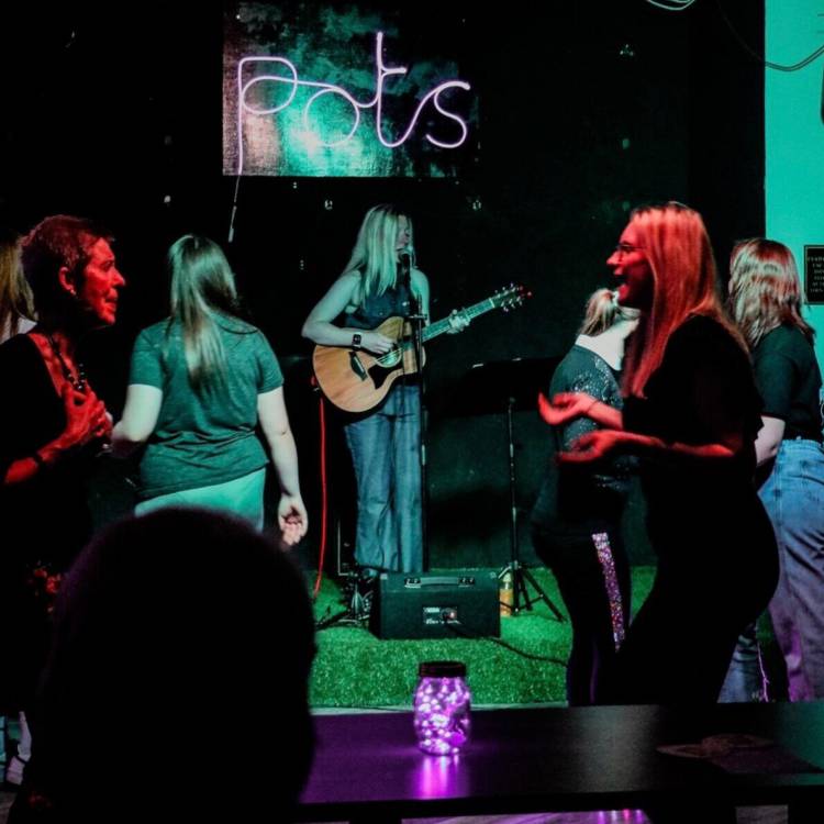 Hannah Popey performing during her charity concert at Conwy Comrades Sports & Social Club