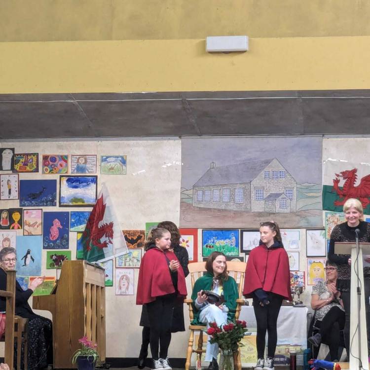 Elan Robat Owen receiving the Young People Trophy at Eisteddfod Mynytho