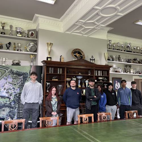 Coleg Menai students in the trophy room at the M-Sport factory in Cumbria