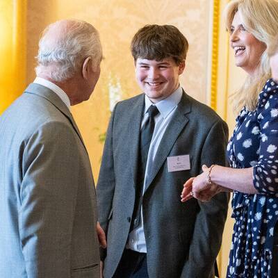 Rhys Morris talking to King Charles at Buckingham Palace