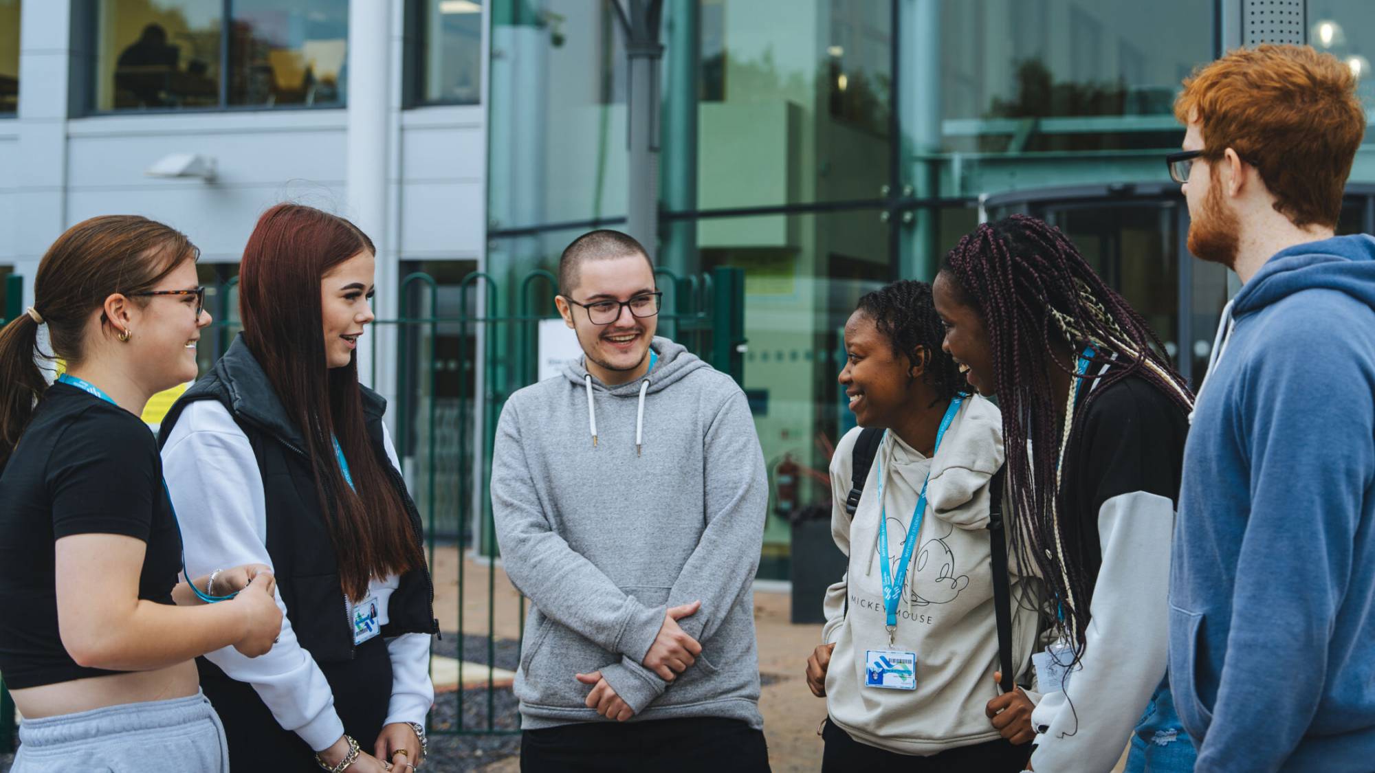 Learners talking outside the Rhyl campus