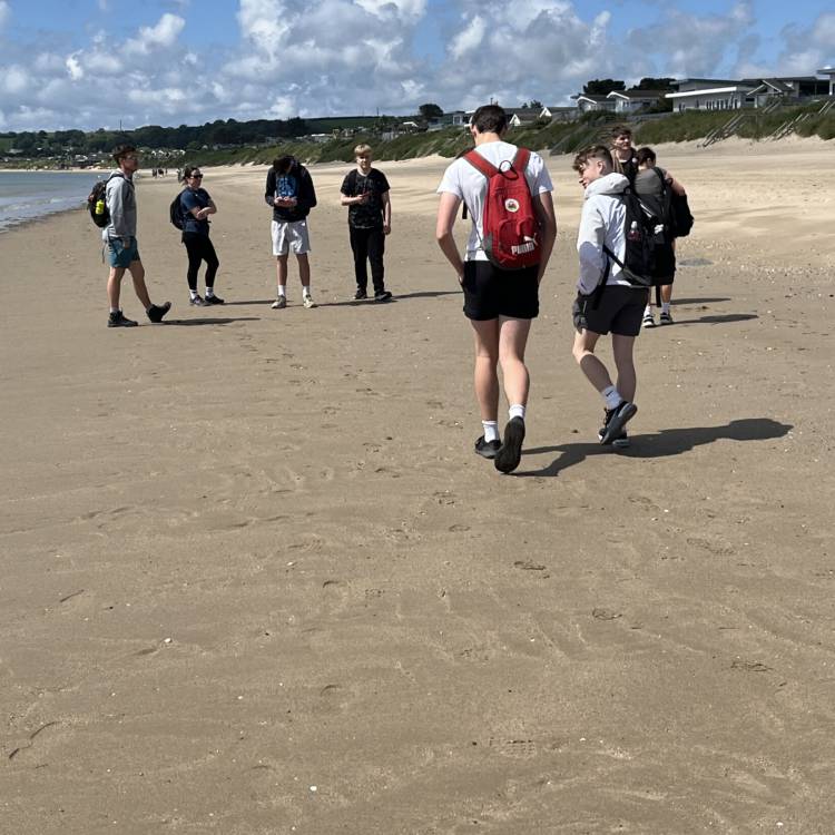Learners on a sponsored walk from Pwllheli to Porth Neigwl