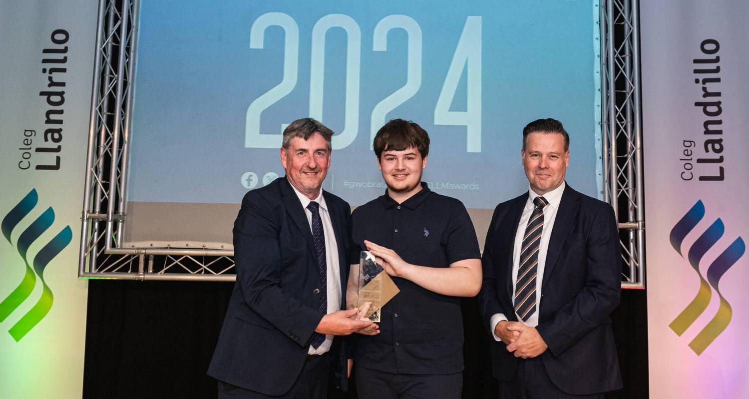 Rhys Morris with his trophy for winning Coleg Llandrillo’s Overall Achiever of the Year award