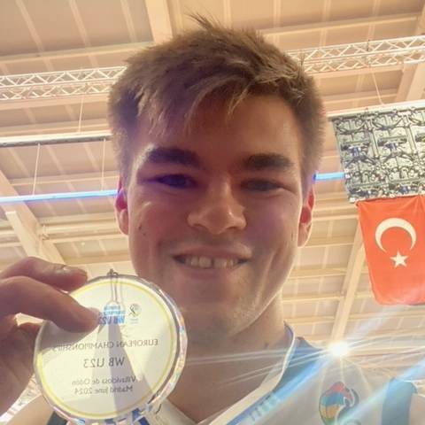 Alex Marshall-Wilson with his medal after Great Britain won the European under-23 wheelchair basketball championships