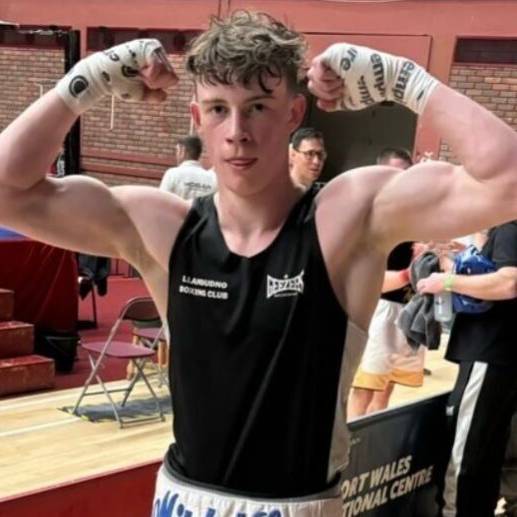 Mitchel Jones outside a boxing ring