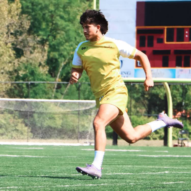 Former Coleg Llandrillo student Zac Hay running on the pitch during training for Wheeling Cardinals