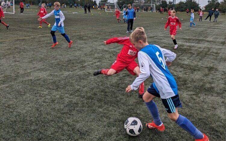 Children playing football in the Urdd Conwy open primary school football tournament at Coleg Llandrillo’s Rhos-on-Sea campus