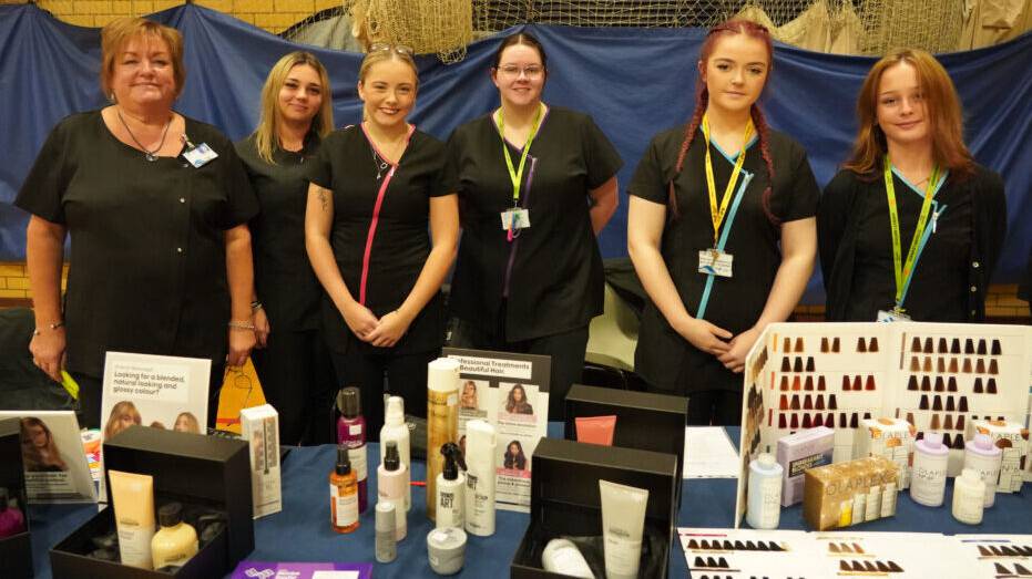 Coleg Meirion-Dwyfor hairdressing students and staff at the Iechyd Da event in Dolgellau