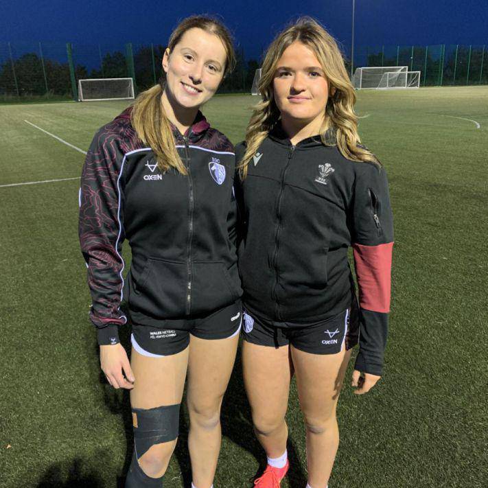 Saran Griffiths and Leah Stewart on the 3G pitch at Coleg Llandrillo’s Rhos-on-Sea campus