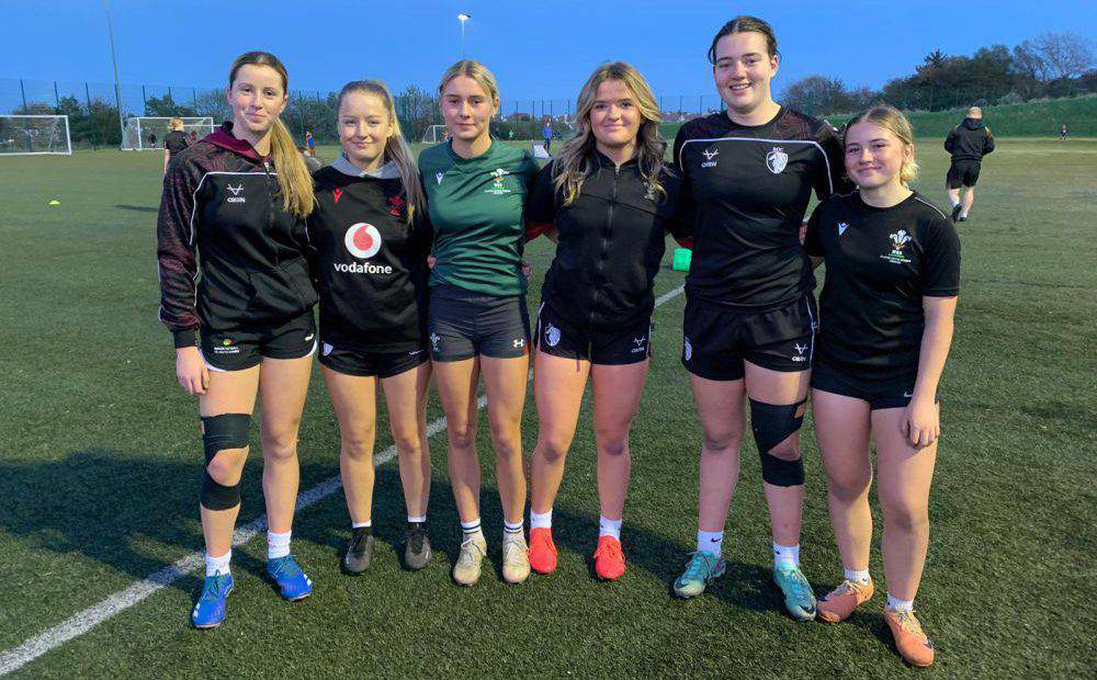 Six students from Grŵp Llandrillo Menai's girls' rugby who have been selected for a Wales under-18s training camp