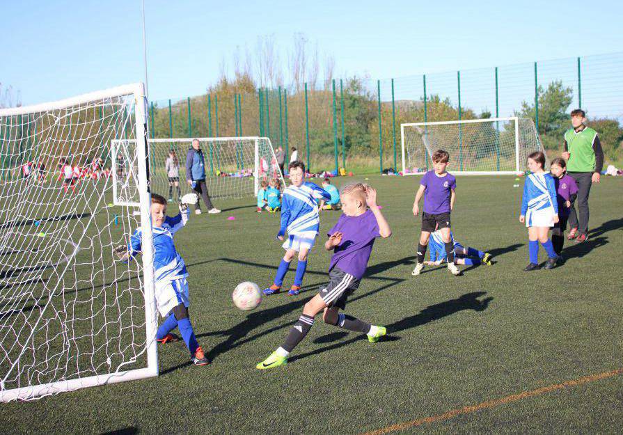 Children playing in the Urdd Conwy football tournaments on the 3G pitch at Coleg Llandrillo’s Rhos-on-Sea campus