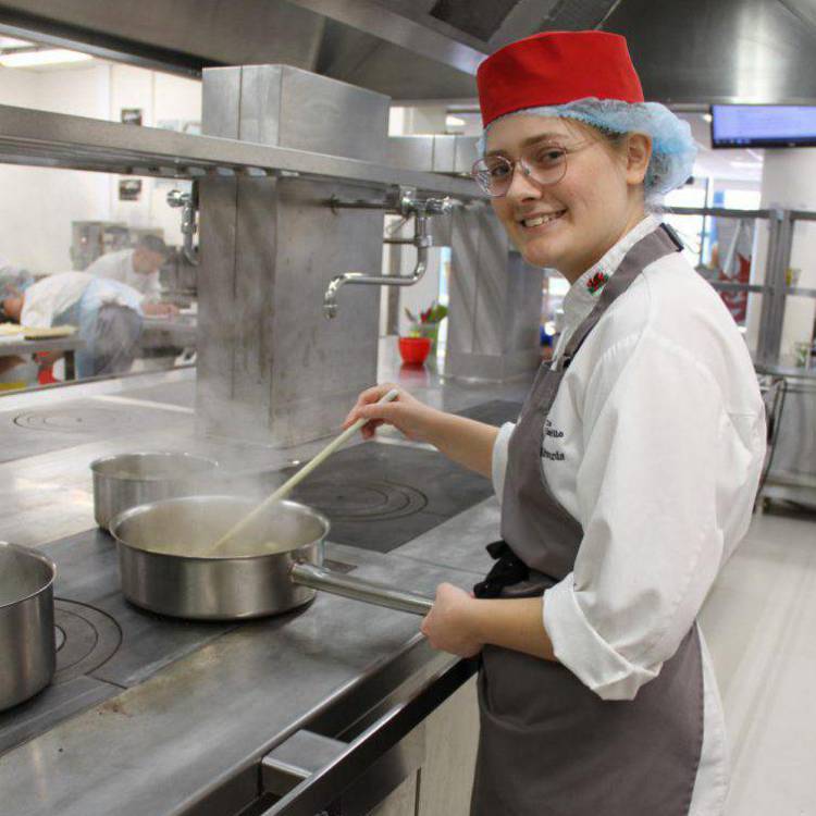 Coleg Llandrillo student Bethan Edwards preparing food in the Orme View Restaurant kitchen at the Rhos-on-Sea campus
