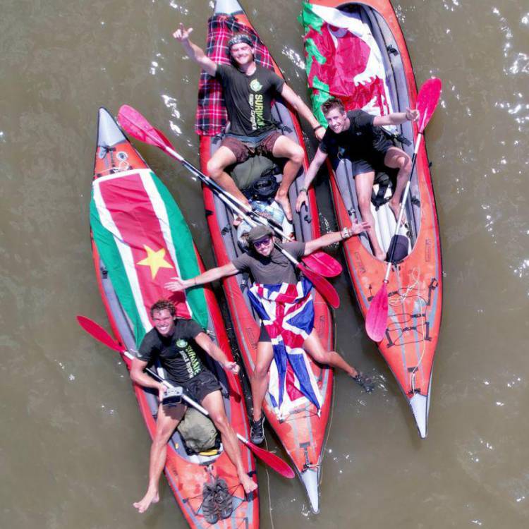 Ash Dykes and his team in kayaks on the Coppename River in Suriname