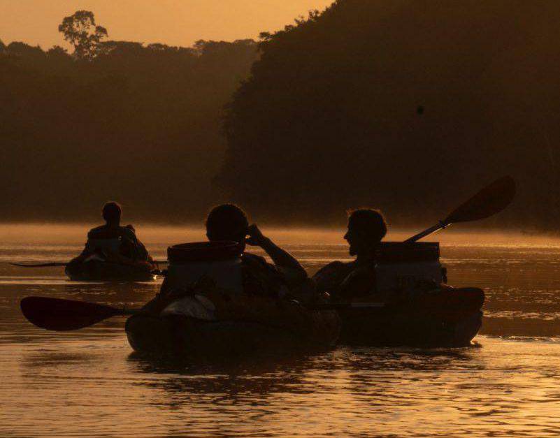 Ash Dykes and his team kayaking on the Coppename River in Suriname