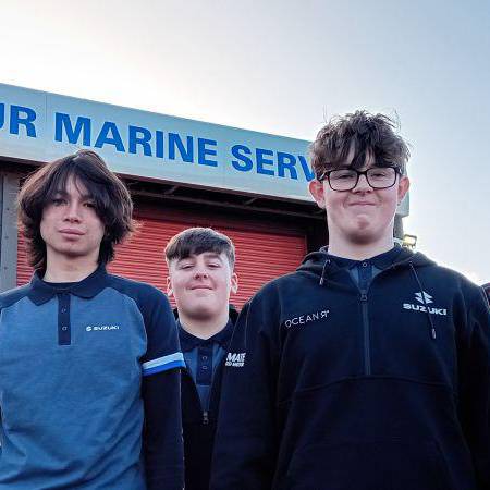 Coleg Meirion-Dwyfor students Ben, Osian and Tom at Harbour Marine Services, Pwllheli