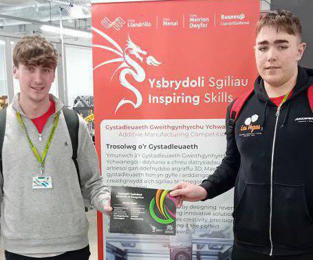 Coleg Meirion-Dwyfor students Keegen and Jordan with their certificate after competing in Skills Competition Wales