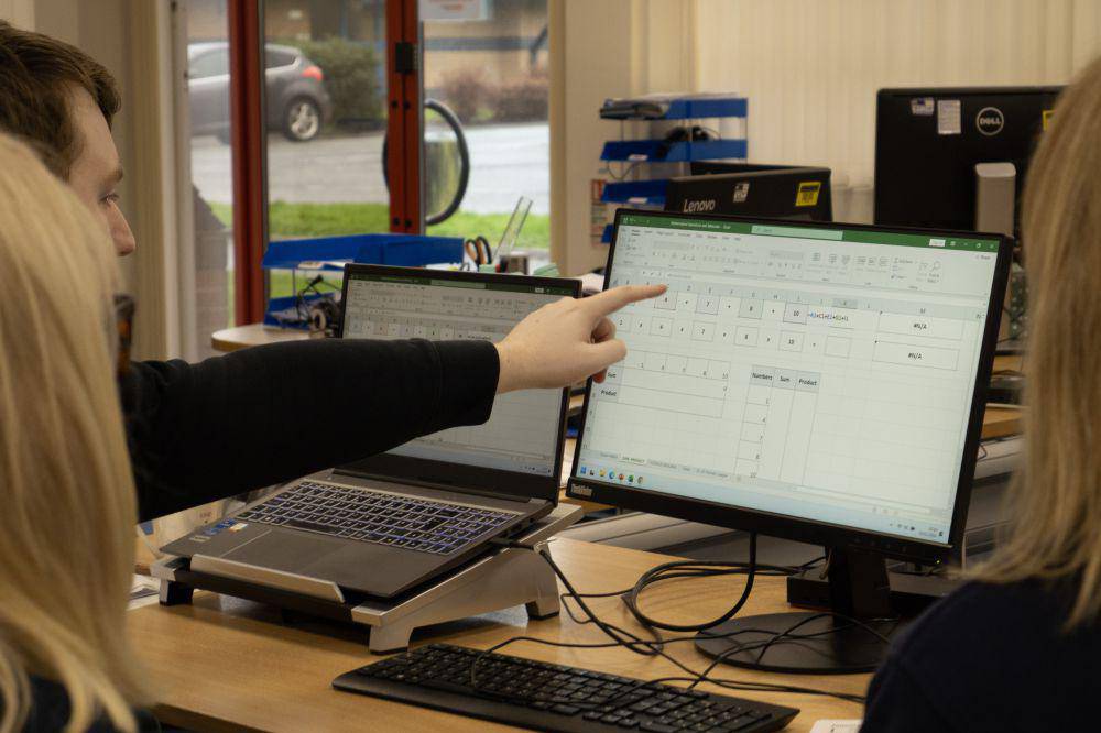 NHS staff learning to use spreadsheets with Multiply tutor Stephen Jones