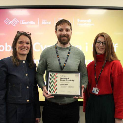 Dylan Owen with Gwenllian Roberts and Angharad Roberts