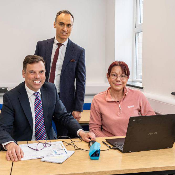 Ken Skates MS and Siôn Peters-Flynn with a learner