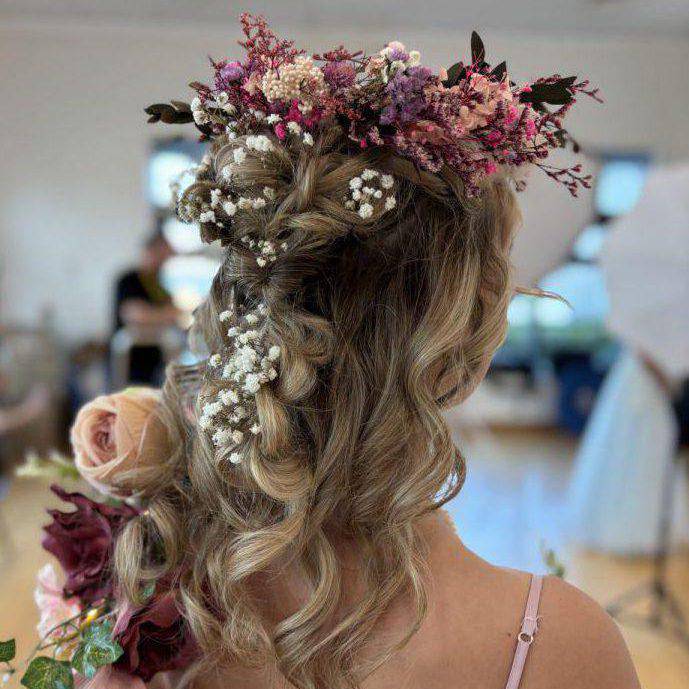 Gracie Calland with her hair styled by fellow Coleg Llandrillo student Kayleigh Blears at the Concept Hair Learner of the Year UK final