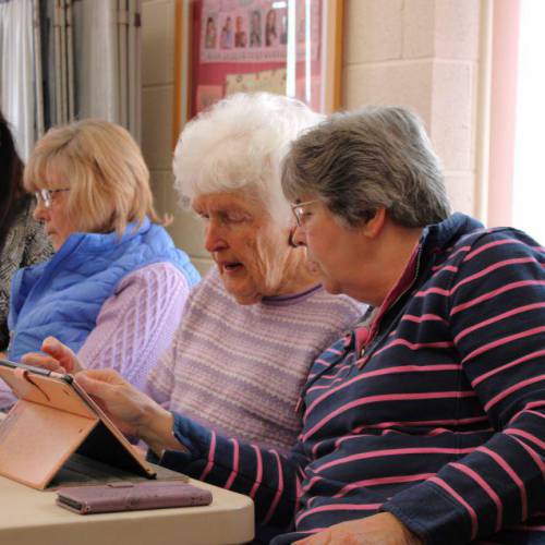 Two learners using an iPad