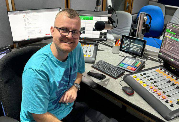 Rheinallt Wyn Davies in the Môn FM radio studio