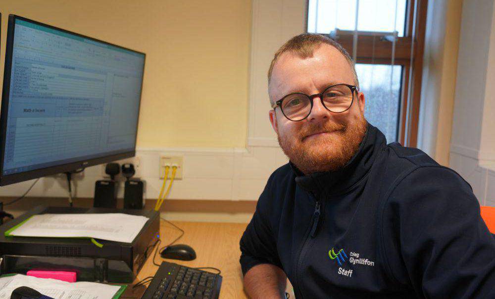 Rheinallt Wyn Davies at his desk in the Glynllifon campus