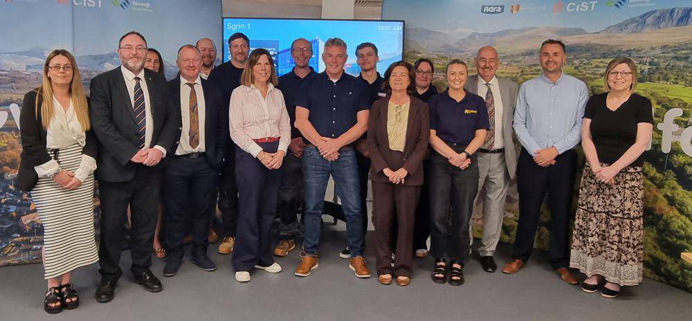 Group photo of with Eluned Morgan in the centre.